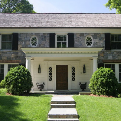 Elegant stone exterior home photo in New York