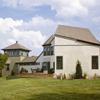 Inspiration for a timeless two-story wood exterior home remodel in Boston