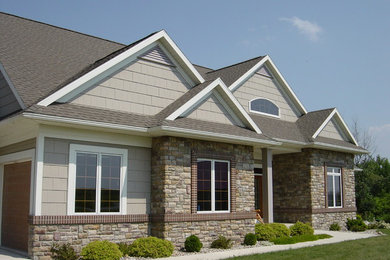 Example of an arts and crafts exterior home design in Other