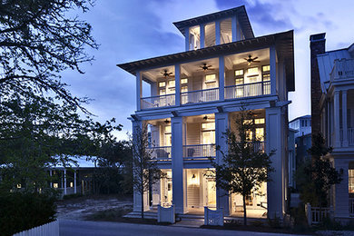 This is an example of a beach style house exterior in Birmingham.