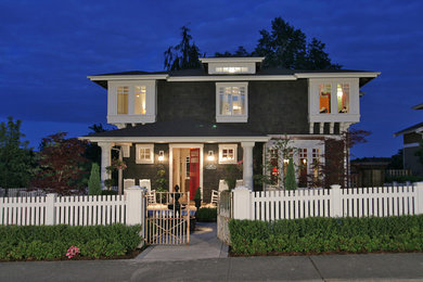 Example of a mid-sized classic two-story exterior home design in Seattle
