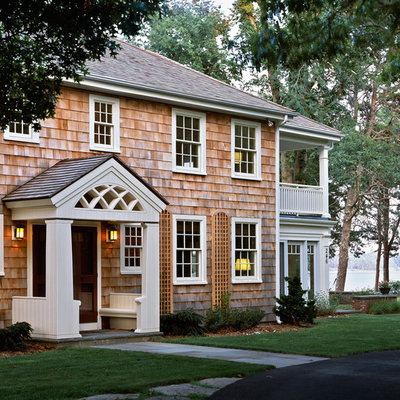 Inspiration for a timeless two-story wood exterior home remodel in Boston