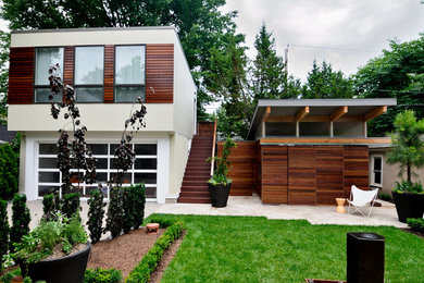 Photo of a contemporary house exterior in Kansas City with mixed cladding.