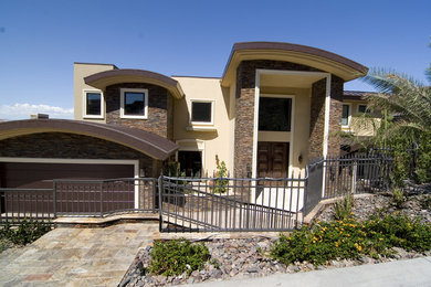 Example of a tuscan exterior home design in Las Vegas
