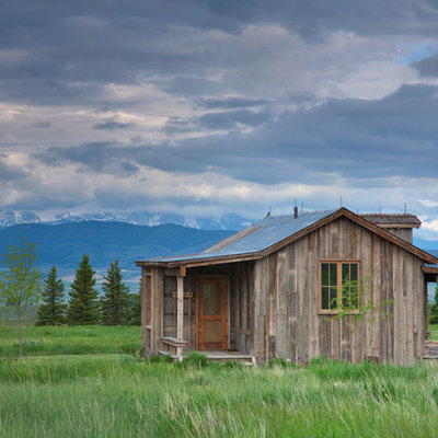 Inspiration for a small rustic one-story wood exterior home remodel in Other