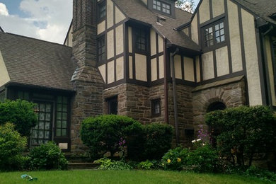 Elegant beige three-story mixed siding exterior home photo in Philadelphia