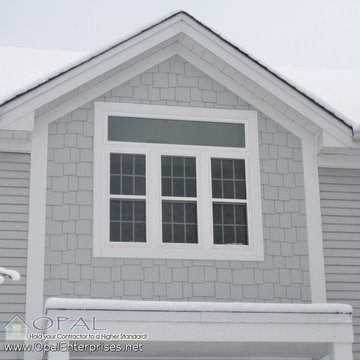 Shingle Siding in Light Mist by James Hardie and White Alside Vinyl Windows