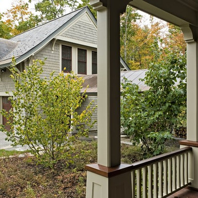 Example of a classic wood exterior home design in Burlington