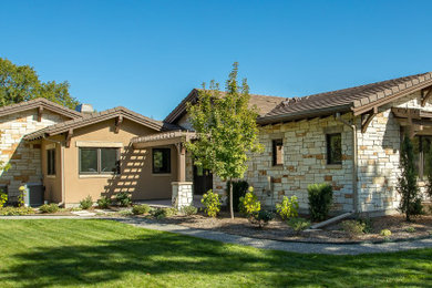 Example of an arts and crafts exterior home design in Denver