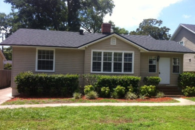 This is an example of a small and beige traditional bungalow house exterior in Jacksonville.