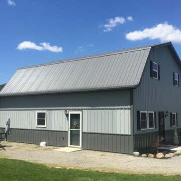 Silver Metal Roof on Gambrel-Style Home