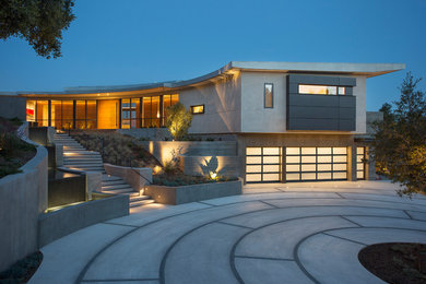 Inspiration for a contemporary gray two-story concrete house exterior remodel in Santa Barbara
