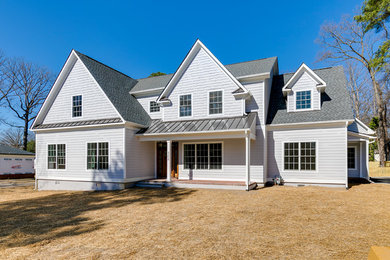 Inspiration for a large gray two-story mixed siding exterior home remodel in Richmond