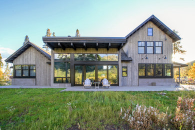 Example of a cottage exterior home design in Denver