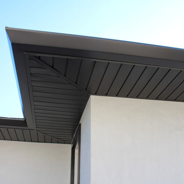 Soffits, Fascia, and Angle Face Gutters in Dark Bronze Aluminum. Long Beach