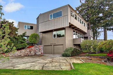 シアトルにあるミッドセンチュリースタイルのおしゃれな大きな家の写真