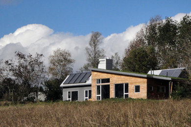 Réalisation d'une façade de maison design.