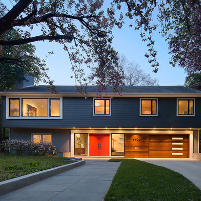 Large mid-century modern gray split-level mixed siding gable roof idea in DC Metro