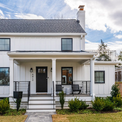 Mid-sized transitional white two-story wood exterior home photo in DC Metro with a shingle roof