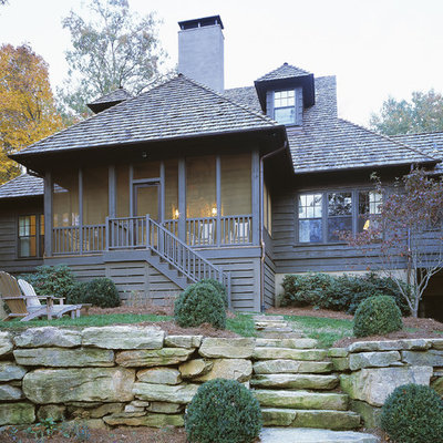 Inspiration for a timeless wood exterior home remodel in Atlanta with a hip roof