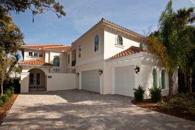 Example of a tuscan exterior home design in Orlando