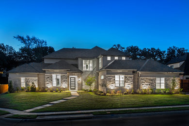 Example of a transitional exterior home design in Dallas