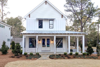 Mid-sized country white two-story concrete fiberboard gable roof photo in Raleigh