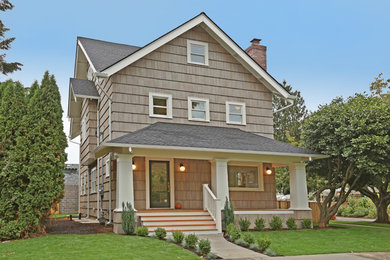 Example of a transitional white three-story wood gable roof design in Portland
