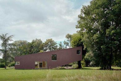 Exemple d'une façade de maison tendance.