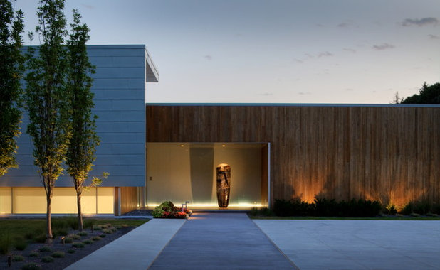 Contemporary Exterior by McKay Landscape Lighting