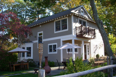 Example of a classic wood exterior home design in New York