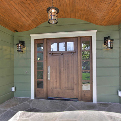 Example of an arts and crafts green exterior home design in San Francisco
