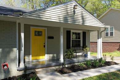 Example of an eclectic exterior home design in Raleigh