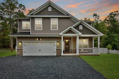 Example of a two-story exterior home design in Other