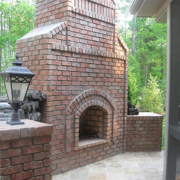 Stand-alone brick outdoor fireplace