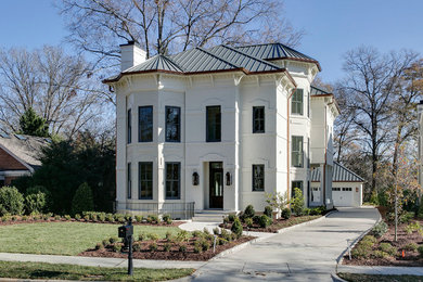 Example of a tuscan exterior home design in Raleigh