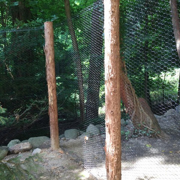 Steel Hex Web Deer Fence with Bark-On Cedar Posts