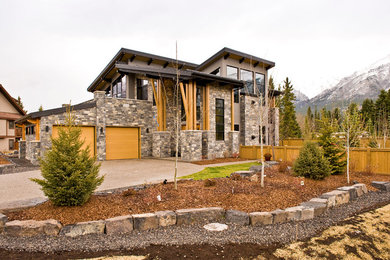 Example of a mountain style exterior home design in Calgary