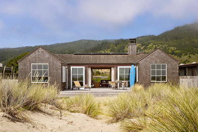 Inspiration for a small coastal one-story wood gable roof remodel in San Francisco