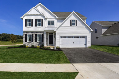 Mid-sized transitional white two-story exterior home idea in Other