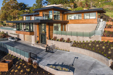 Example of a huge trendy three-story wood exterior home design in San Francisco