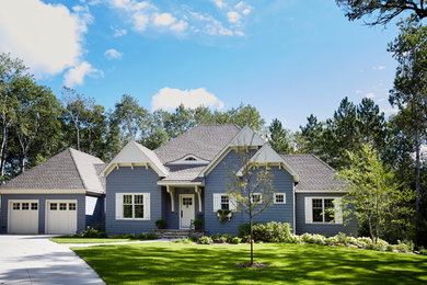 Example of a classic blue exterior home design in Minneapolis