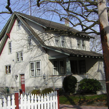 Stucco Exterior of a Gray, Red and Green Cape May House Painted