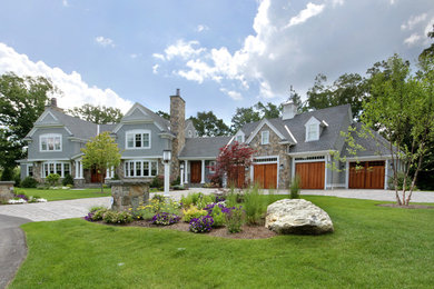 Huge traditional gray two-story mixed siding gable roof idea in Boston