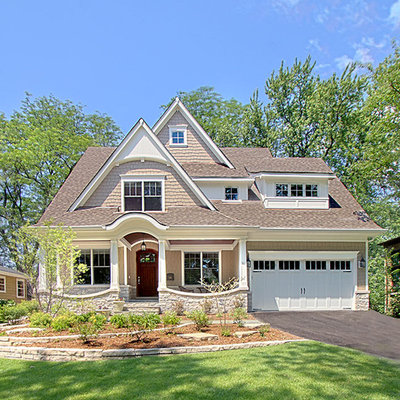 Mid-sized elegant gray two-story mixed siding exterior home photo in Chicago with a clipped gable roof