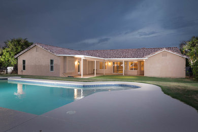 Example of a trendy exterior home design in Phoenix
