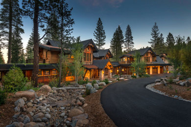 Mountain style exterior home photo in Other with a mixed material roof