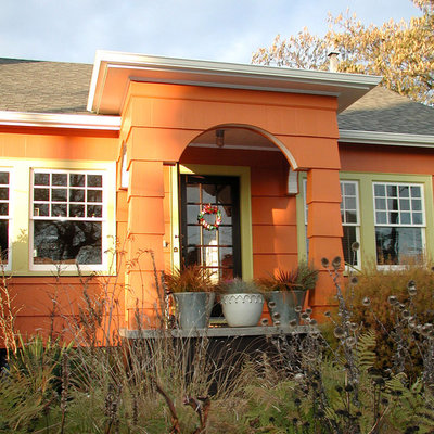 Inspiration for an eclectic orange exterior home remodel in Portland