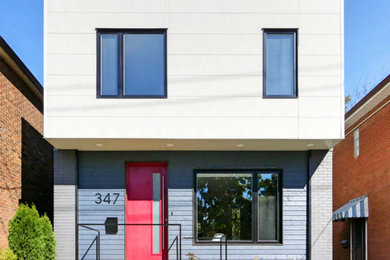 Mid-sized minimalist gray two-story house exterior photo in Toronto