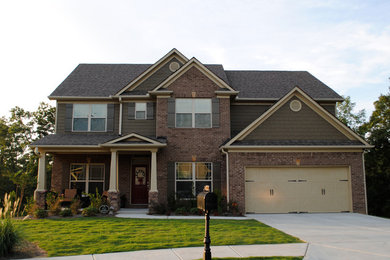 Inspiration for a mid-sized craftsman brown two-story mixed siding exterior home remodel in Atlanta with a shingle roof